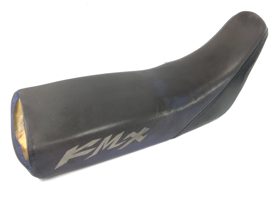 Kawasaki KMX 125 [1996] - Housse de siège du coussin de siège endommagée