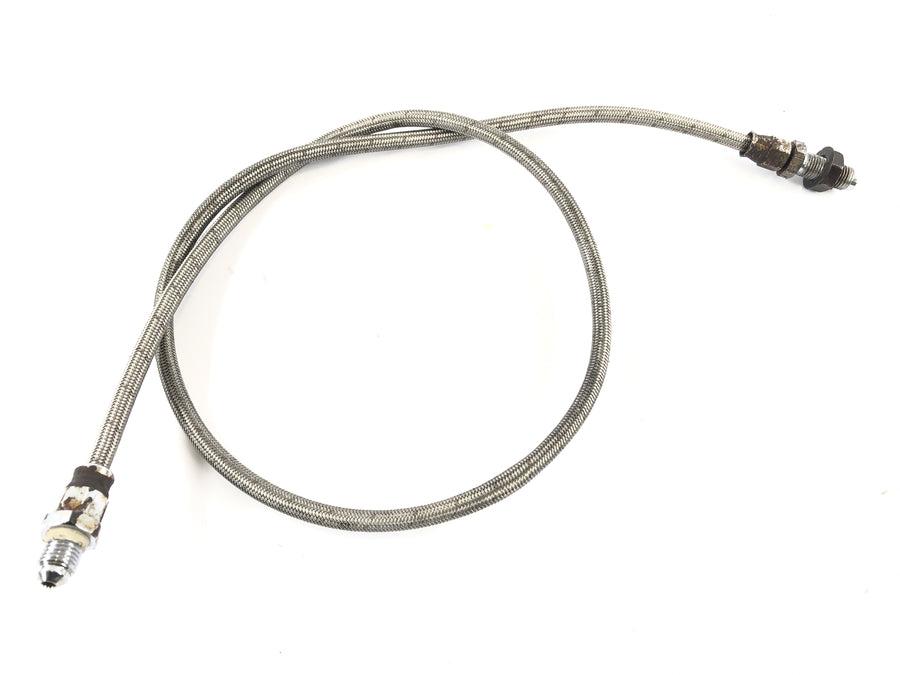 Triumph Bonneville T140V [1976] - brake line at the front steel flex